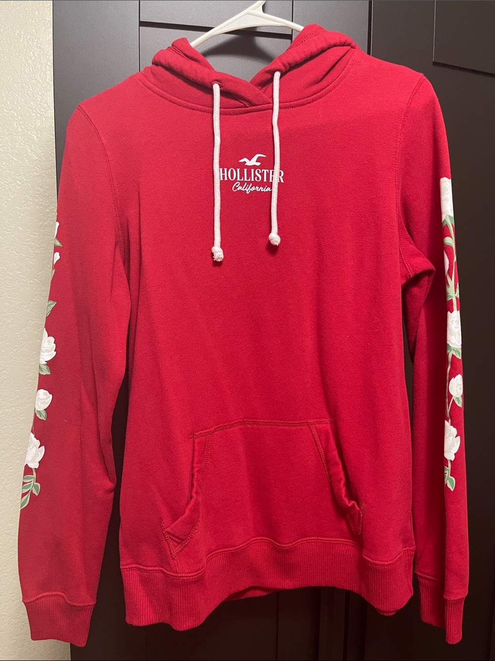 Hollister Red Hoodie with White Floral Sleeve Detail